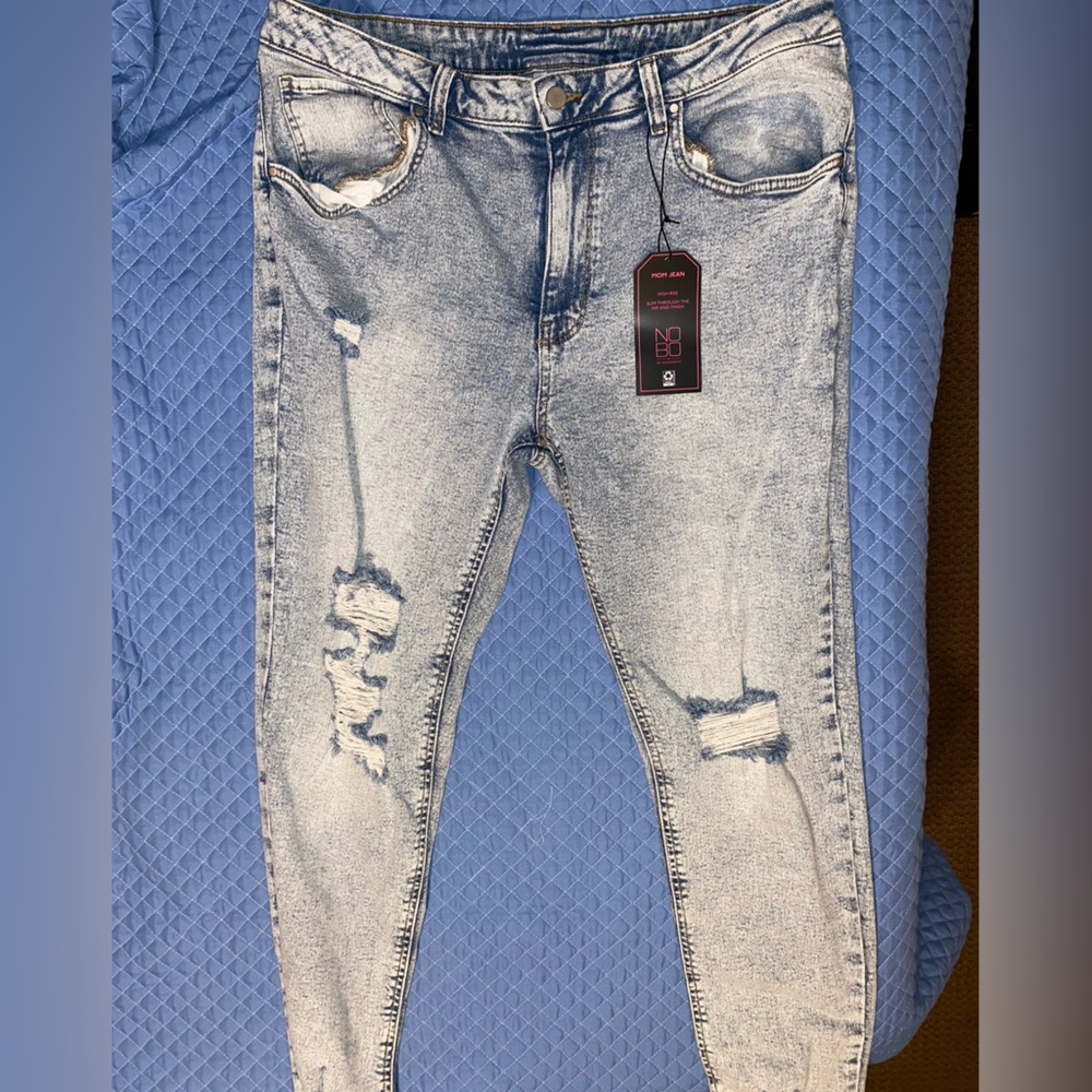 Distressed Light Blue Jeans